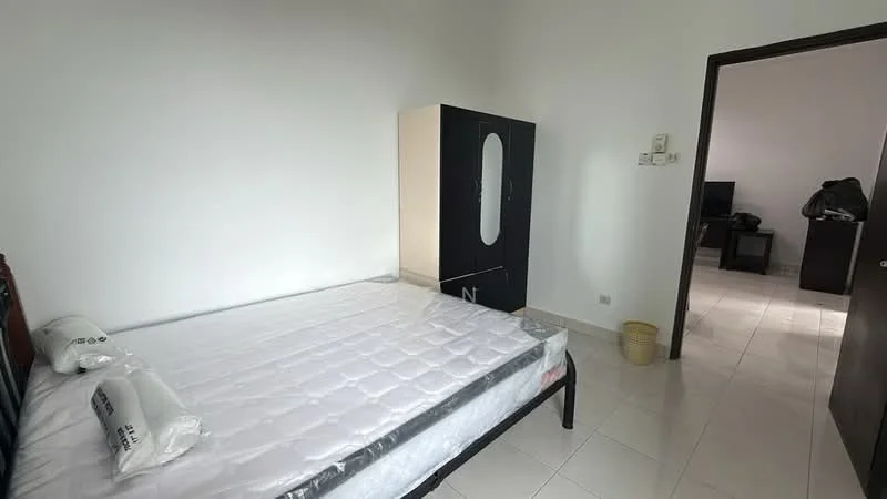 Bedroom features: white painted walls, tile flooring, double bed frame, mattress with protective cover, black wardrobe with mirror, small waste bin, window with natural light, doorway leading to another room.