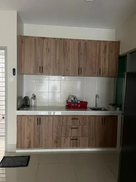 Kitchen features: wood cabinetry with brown finish, white countertop, single-bowl stainless-steel sink, chrome pull-down faucet, built-in refrigerator, kitchen utensils in red basket, white tiled backsplash, ceramic tile flooring, wall-mounted cabinet, under-cabinet lighting; style: modern.