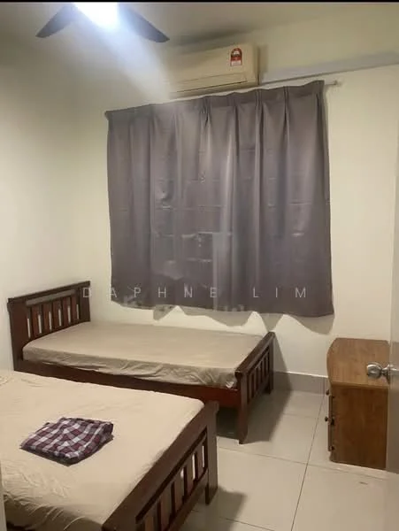 Bedroom features: two single beds with wooden frames, beige bedding on beds, grey curtains, wall-mounted split AC unit, white painted walls, tiled flooring, wooden bedside table, checkered throw on one bed.
