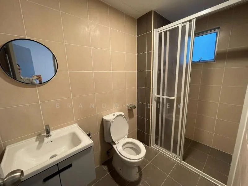 Bathroom features: white ceramic sink with cabinet, chrome basin mixer, round framed mirror, white toilet, shower with glass enclosure, grey tiled walls, dark grey tiled flooring, window for natural light; style: modern.