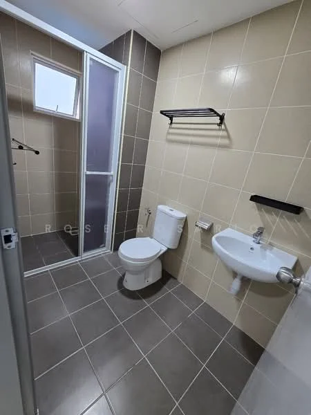 Bathroom features: cream tiled walls, grey tiled flooring, one-piece toilet, wall-mounted sink, chrome faucet, glass shower enclosure, black wall-mounted towel rack, window for natural light; style: modern.