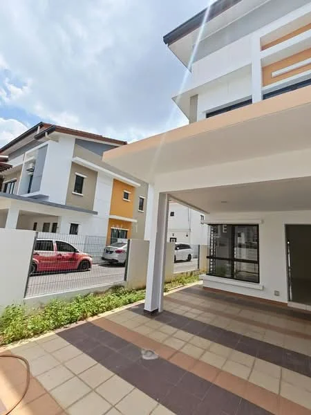 Exterior type: linked terrace house; features: white painted facade, yellow accent wall, flat roof, single-storey, manicured lawn, paved walkway, car porch with awning, surrounded by fencing, adjacent to other houses, driveway with interlocking pavers; style: modern.