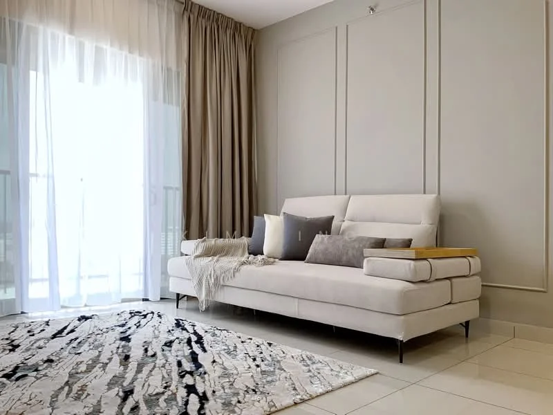Living features: light grey fabric sectional sofa, decorative cushions in various shades, area rug with abstract pattern, floor-to-ceiling windows, sheer curtains, cream painted walls, recessed lighting, tile flooring, decorative wall paneling; style: modern.