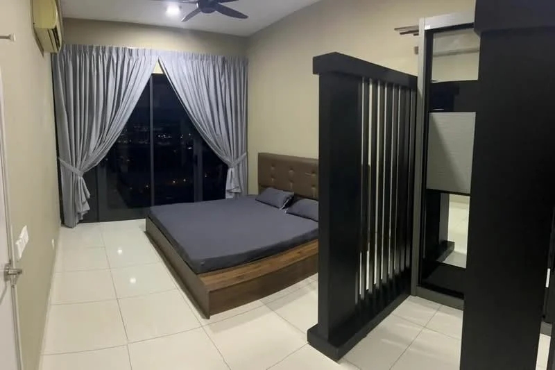 Bedroom features: king-size bed, upholstered headboard, floor-to-ceiling windows, grey curtains, white walls, white tiled flooring, ceiling fan, decorative room divider, nightstand, wall-mounted mirror; style: modern; view: city.