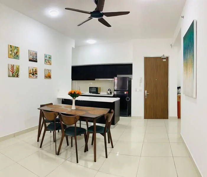 Dining features: dining table with wooden surface, 4 wooden dining chairs, pendant light, white painted walls, cream tiled flooring, kitchen island with countertop, black cabinetry, stainless-steel fridge, microwave, kettle, decorative wall art, vase with flowers; style: modern. Kitchen features: black cabinetry, white countertop, stainless-steel appliances, microwave, kettle; style: modern.