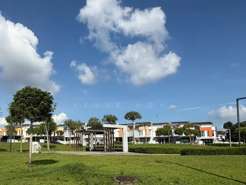 Exterior type: linked terrace house; features: green lawn, mature trees, park area, pergola structure, surrounding landscaping, residential buildings in background, clear blue sky, white clouds; style: modern.
