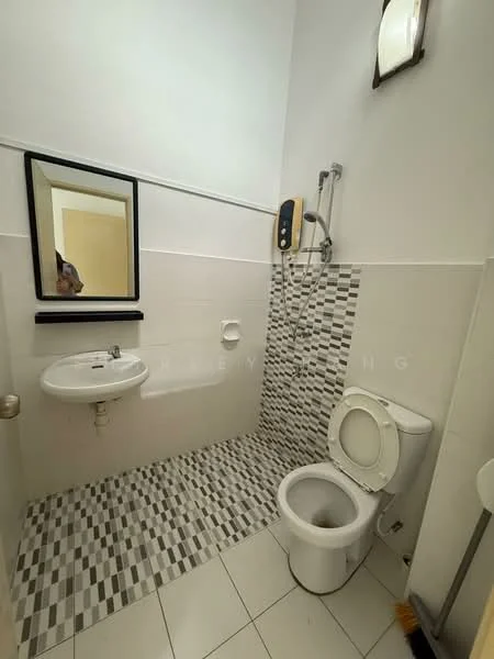 Bathroom features: white tiled walls, grey and white mosaic tile flooring, single-sink vanity with wall-mounted mirror, chrome basin mixer faucet, toilet, shower with handheld showerhead, wall-mounted shower control, light fixture above mirror; style: modern.