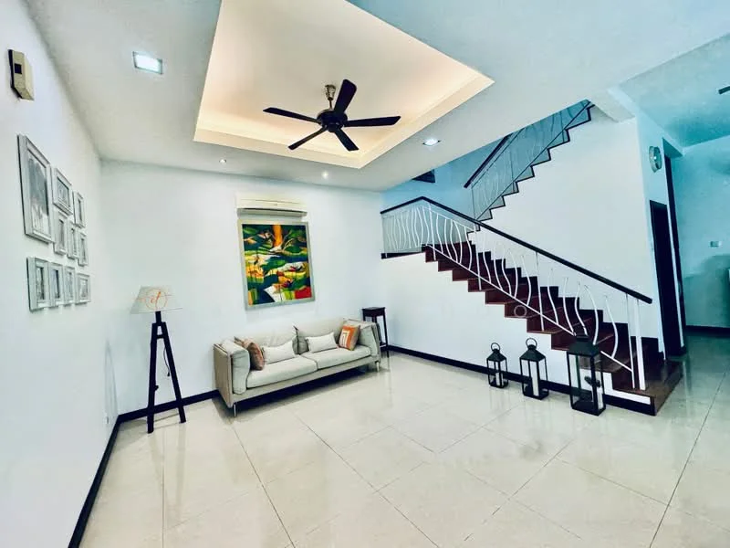 Living features: cream painted walls, white ceiling with recessed lighting, 5-blade ceiling fan with light, marble tile flooring, sofa in light grey fabric, decorative artwork on wall, floor lamp, decorative lanterns, staircase with wooden steps and white railing, air conditioning unit; style: modern.