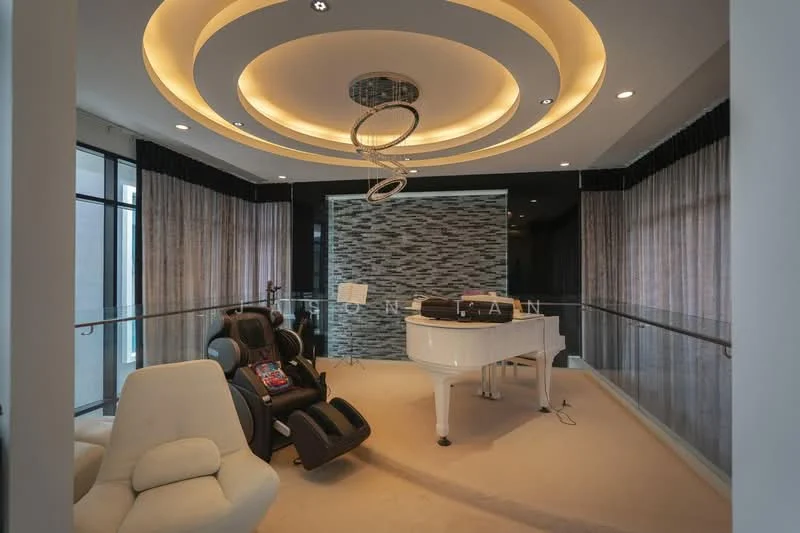 Room features: white grand piano, black accent wall with textured design, recessed ceiling with circular LED lighting, modern chandelier, large windows with sheer curtains, beige carpet flooring, black leather massage chair, glass railing, decorative wall paneling; style: modern.