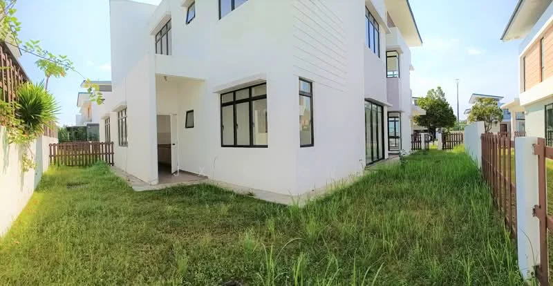 Exterior type: detached bungalow; features: white painted facade, flat roof, large windows, manicured lawn, surrounded by greenery, fenced yard, patio area, two-storey structure; style: modern.