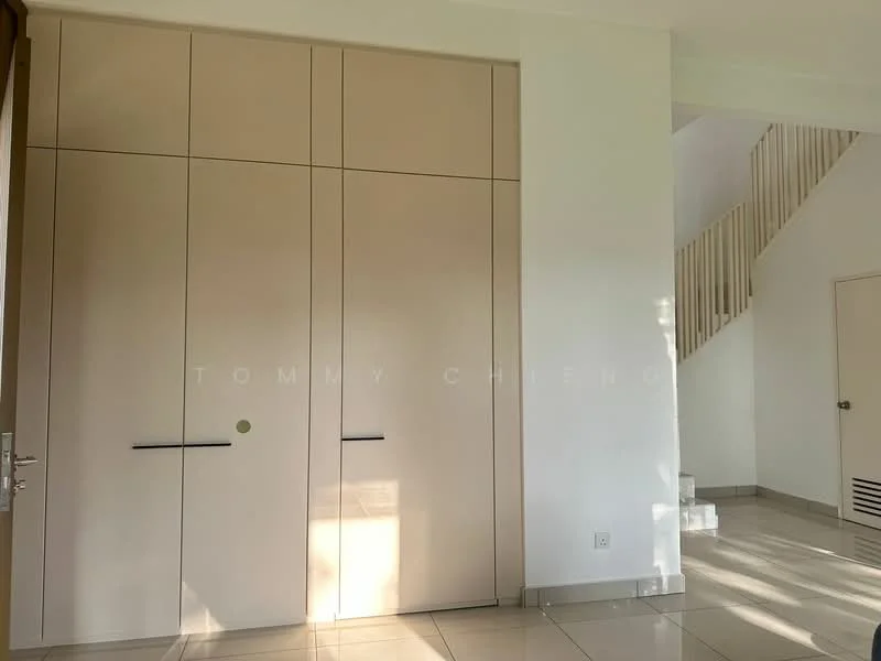Room features: built-in wardrobe with sliding doors, light-colored cabinetry, white walls, tile flooring, staircase visible in background, natural light from window; style: modern.