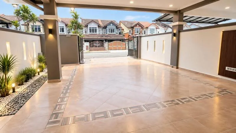 Exterior type: linked terrace house; features: paved driveway, landscaped garden with plants, decorative stone pathway, exterior wall with lighting, main entrance gate, open car porch, modern facade, surrounded by residential houses; style: modern.