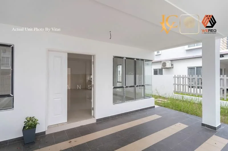 Room features: white painted walls, grey tiled flooring, floor-to-ceiling windows, sliding glass door, exposed ceiling, air conditioning unit, grass area outside, paved walkway; style: modern; view: garden.