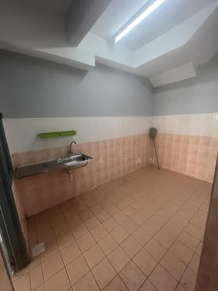 Room features: grey painted walls, pink tiled walls, ceramic tile flooring, single-bowl stainless-steel sink, green wall-mounted shelf, exposed ceiling, no visible appliances, no visible furniture.