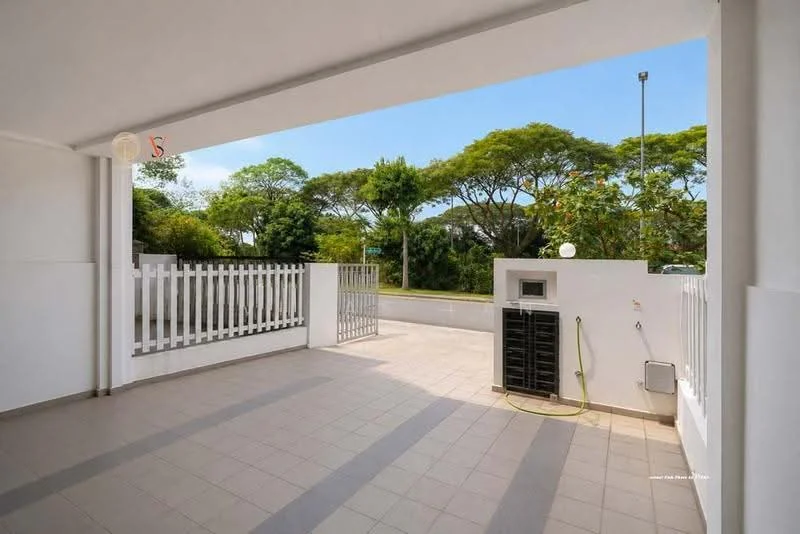 Exterior features: paved flooring, white painted walls, fenced area, landscaped greenery visible, outdoor space, light fixture, water hose connection, storage cabinet; style: modern.