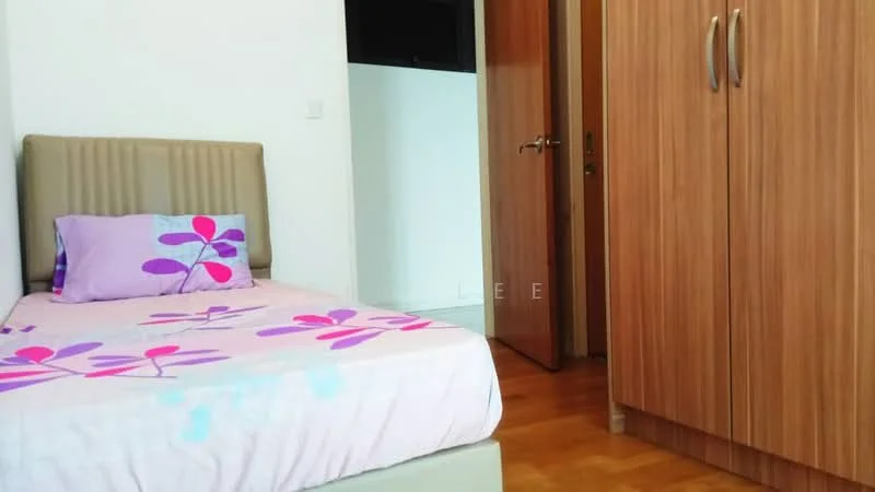 Bedroom features: single bed with floral bedding, upholstered headboard, wooden wardrobe with sliding doors, wooden flooring, white painted walls, decorative pillow with floral pattern, door leading to hallway.