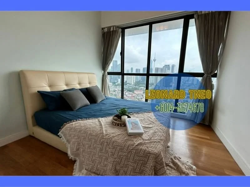 Bedroom features: king-size bed with upholstered headboard, blue bedding, two decorative pillows, throw blanket, wooden flooring, floor-to-ceiling windows, city skyline view, curtains, side table, decorative book on side table; style: modern; view: city.