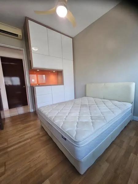 Bedroom features: queen-size bed, light-colored upholstered headboard, wooden flooring, built-in wardrobe with white cabinetry, recessed lighting, ceiling fan, orange accent wall, window with blinds, neutral wall color; style: modern.