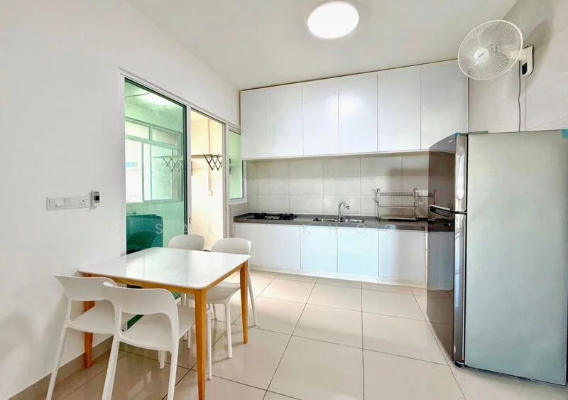Kitchen features: white cabinetry, stainless-steel fridge, built-in gas hob, stainless-steel sink, chrome pull-down faucet, white tiled backsplash, light-colored countertops, dining table with 4 chairs, wall-mounted fan, large window for natural light, ceramic tile flooring, recessed ceiling light; style: modern.