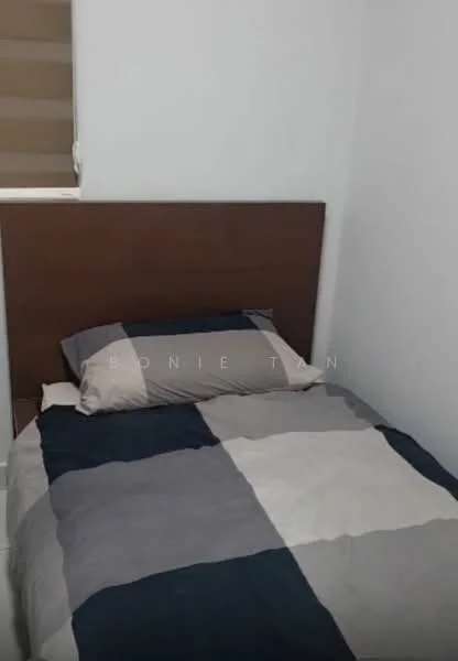 Bedroom features: single bed with patterned bedding, wooden headboard, white painted walls, window with roller blinds, flooring not visible.