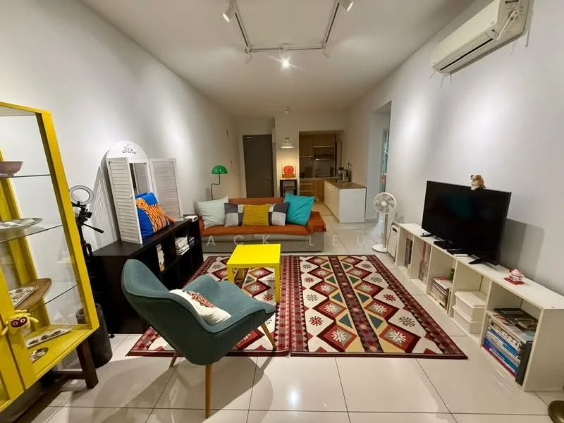 Living features: white painted walls, polished tile flooring, recessed downlights, 5-blade ceiling fan, wall-mounted TV, TV console, sofa with colorful cushions, coffee table in yellow, area rug with geometric pattern, decorative shelving unit, floor lamp, standing fan, decorative items on shelves; style: modern. Kitchen features: open kitchen layout, kitchen counter, stainless-steel appliances, cabinets, unknown countertop material; style: modern.