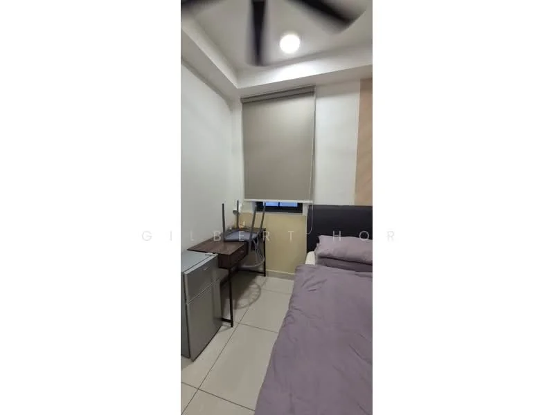Bedroom features: queen-size bed with light purple bedding, wooden headboard, study desk with metal legs, silver mini fridge, window with roller blinds, cream painted walls, tile flooring, ceiling light fixture, ceiling fan; style: modern.