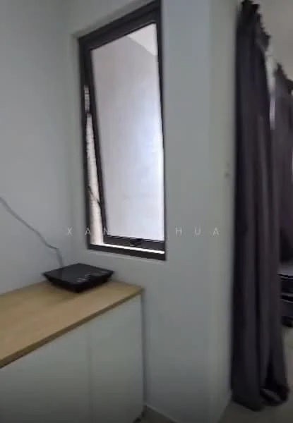 Room features: white painted walls, grey curtains, wooden countertop, built-in cabinetry, window with black frame, tile flooring.