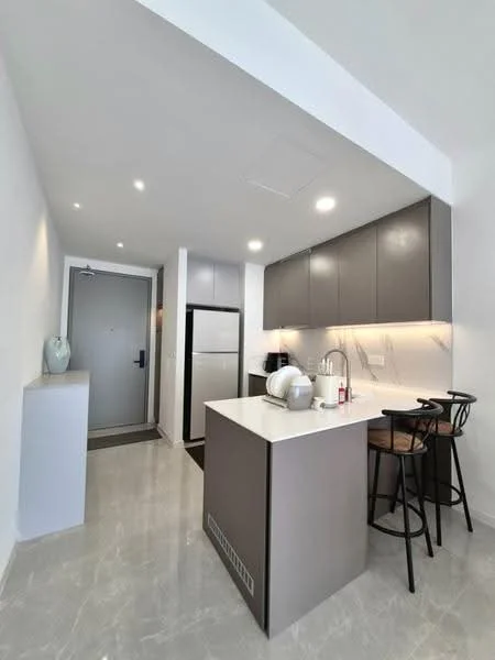 Kitchen features: grey cabinetry, white quartz countertop, stainless-steel fridge, built-in oven, kettle, toaster, bar stools, pendant lighting, recessed downlights, white painted walls, marble tile flooring, open layout, kitchen island; style: modern.