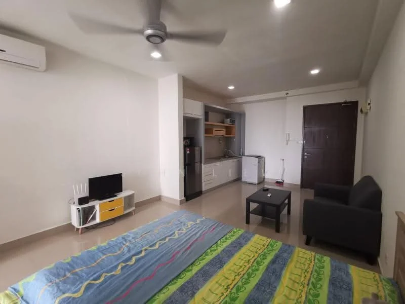 Room features: wall-mounted split AC, 5-blade ceiling fan, light-colored painted walls, tile flooring, kitchenette with upper cabinets, stainless-steel fridge, built-in oven, single-bowl stainless-steel sink, chrome pull-down faucet, countertop with storage below, 2-seater fabric sofa in grey, coffee table, wall-mounted TV, bed with colorful bedding, wooden door, window with natural light; style: modern.