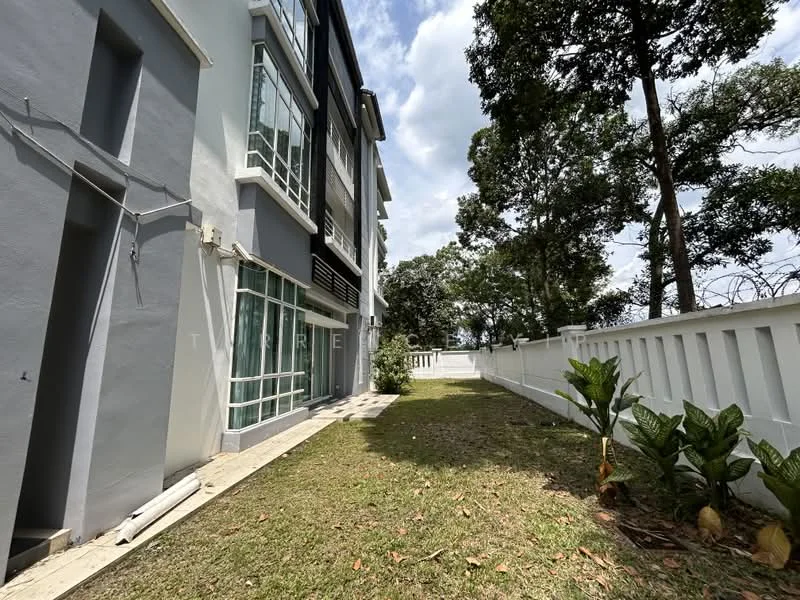 Exterior type: detached bungalow; features: white painted facade, large glass windows, manicured lawn, tropical landscaping, fenced perimeter, side garden area, concrete pathway, surrounded by mature trees; style: modern.