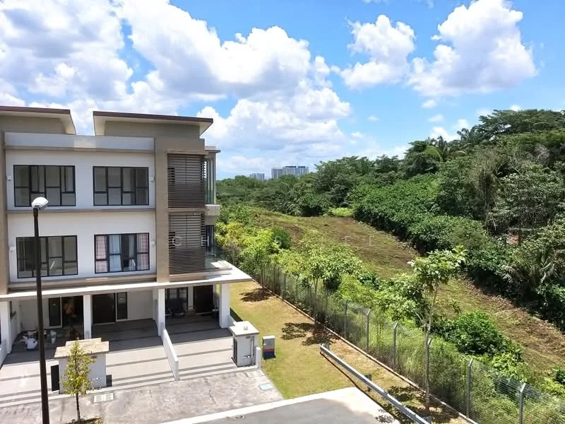 Exterior type: linked terrace house; features: three-storey building, white painted facade, wooden accents, landscaped garden area, manicured lawn, driveway with interlocking pavers, fenced perimeter, surrounded by greenery, clear blue sky, clouds, urban skyline in background; style: modern.