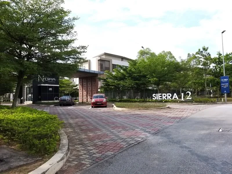 Exterior type: linked terrace house; features: modern facade with large windows, landscaped garden with mature trees, paved driveway, signage for 'SIERRA 12', two parked cars, surrounding greenery, gated entrance, contemporary architectural design; style: modern.