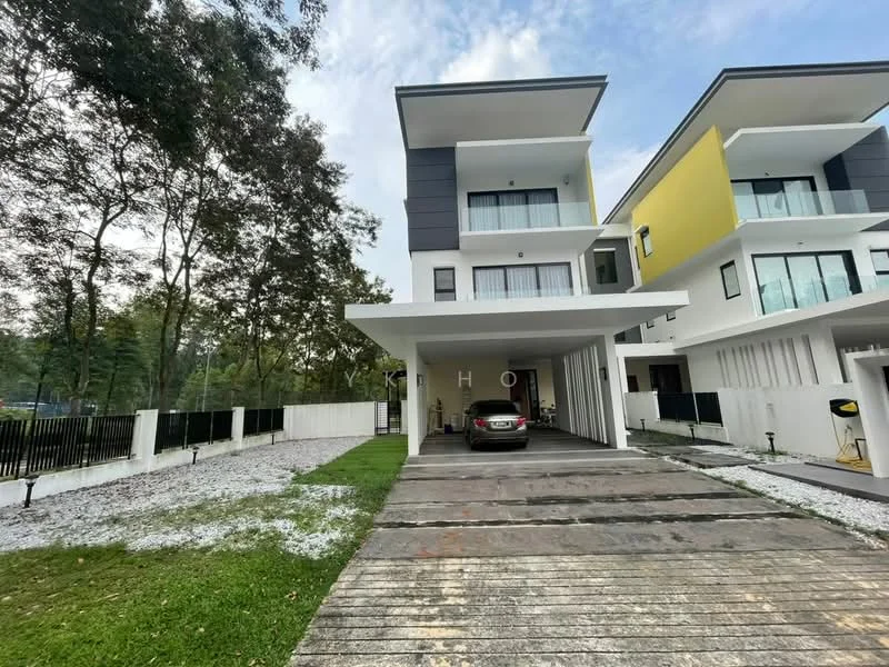 Exterior type: semi-detached house; features: two-storey building, grey and yellow facade, flat roof, car porch with awning, driveway with interlocking pavers, manicured lawn, surrounded by mature trees, fenced perimeter, large windows, balconies on upper floor; style: modern.
