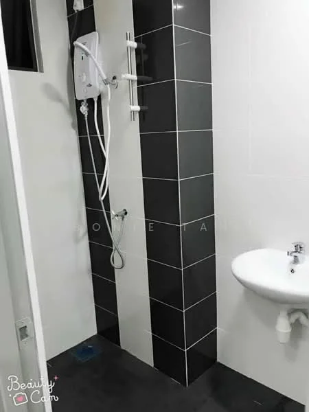 Bathroom features: black and white tiled walls, shower with wall-mounted showerhead, handheld shower, chrome shower mixer, white pedestal sink, chrome basin mixer, mirror above sink, dark tile flooring, toilet roll holder, towel rack; style: modern.