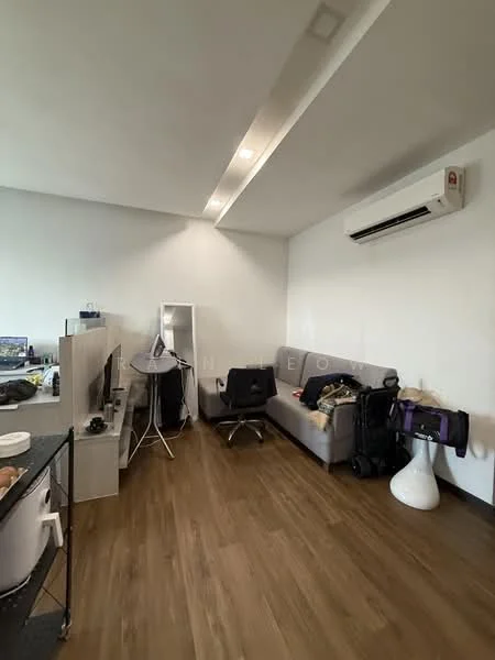 Living features: light wood flooring, white painted walls, recessed ceiling lights, 1 wall-mounted split AC, grey fabric sofa, black office chair, full-length mirror, small white side table, cluttered with bags and equipment; style: modern.