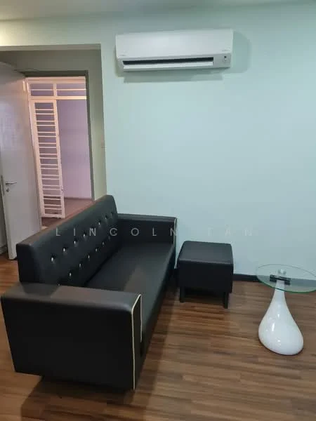 Living features: black leather 3-seater sofa, small black ottoman, white round side table, wall-mounted split AC, laminate wood flooring, light green painted walls, doorway leading to another room, decorative wall art; style: modern.