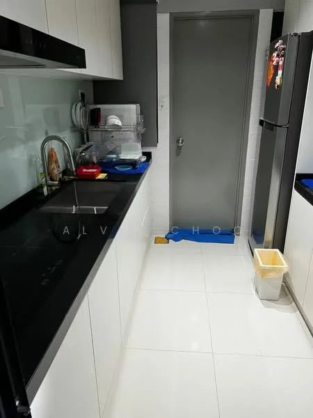 Kitchen features: black granite countertop, white cabinetry, stainless-steel single-bowl sink, chrome pull-down faucet, built-in refrigerator, white tiled backsplash, ceramic tile flooring, under-cabinet lighting, kitchen appliances visible, grey wall, door to hallway; style: modern.