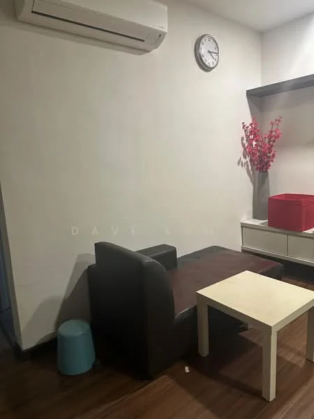 Living features: brown leather sofa, small white coffee table, blue stool, wall-mounted air conditioning unit, wall clock, decorative red flowers in vase, white sideboard, dark wood flooring, neutral painted walls; style: modern.