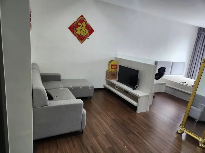Living features: grey fabric L-shape sectional sofa, white TV console, wall-mounted TV, wood laminate flooring, decorative wall art, curtains, bed in background, mirror, black office chair; style: modern.