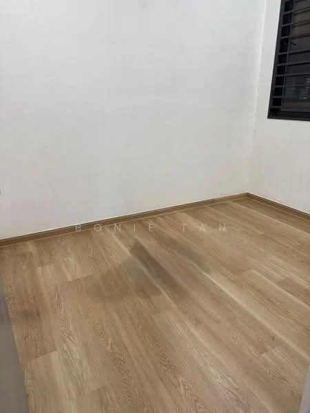 Room features: light wood laminate flooring, white painted walls, black window with horizontal bars, no visible furniture or decor; style: minimalist.
