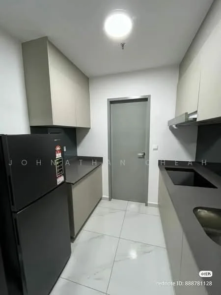 Kitchen features: black fridge, grey cabinetry, black countertop, single-bowl stainless-steel sink, chrome pull-down faucet, white walls, marble tile flooring, recessed downlights, door to hallway; style: modern.