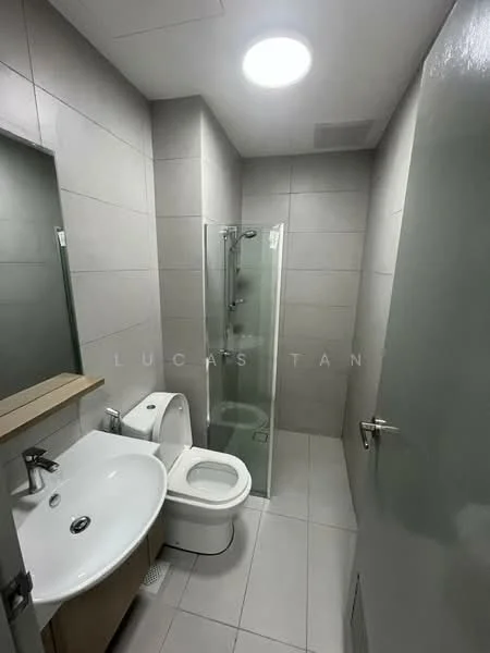 Bathroom features: grey tiled walls, white ceramic floor tiles, single-sink vanity with wood cabinet, chrome basin mixer faucet, framed mirror, one-piece toilet, walk-in shower with glass enclosure, rain shower head, recessed ceiling light; style: modern.