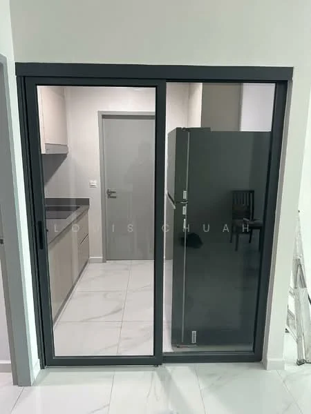 Room features: sliding glass door, grey frame, stainless-steel fridge, light grey cabinetry, black countertop, white marble tile flooring, neutral wall colour, door to adjacent room; style: modern.