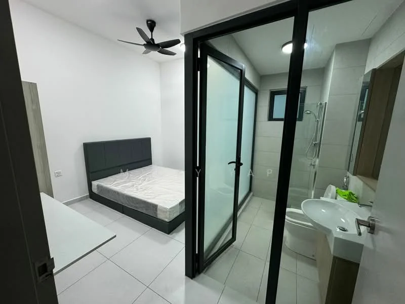 Bedroom features: queen-size bed without bedding, grey upholstered headboard, white walls, ceiling fan, floor-to-ceiling windows, white tiled flooring, built-in wardrobe, natural light from window; style: modern. Bathroom features: single-sink vanity with wood cabinet, chrome basin mixer, toilet, shower with glass enclosure, tile cladding, mirror, white tiled flooring, natural light from window; style: modern.