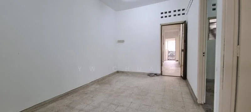 Room features: white painted walls, tile flooring, single door, door frame, window opening, light source from ceiling, no visible furniture, neutral color scheme.