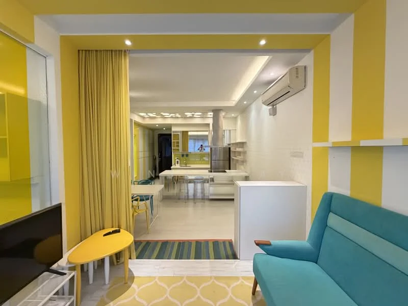 Living features: light grey tiled flooring, white painted walls, yellow accent wall, blue fabric sofa, yellow side table, TV console, wall-mounted TV, curtains, recessed LED downlights, 1 wall-mounted split AC, area rug with geometric pattern; style: modern; view: city. Room features: open-plan layout, dining area visible, kitchen area visible.