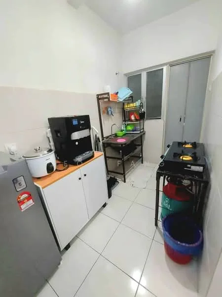 Kitchen features: white painted walls, glossy white tile flooring, stainless-steel fridge, built-in coffee machine, electric rice cooker, black gas stove with two burners, metal kitchen cart, sink with faucet, window with sliding glass, open shelving, colorful dishware, plastic trash bin; style: modern.