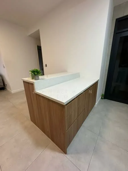 Kitchen features: island countertop with white surface, wood cabinetry, drawers on island, grey tile flooring, white painted walls, recessed lighting, open layout, plant decoration on countertop; style: modern.