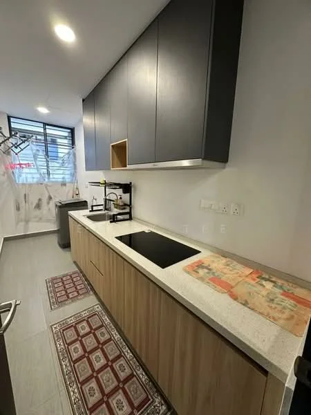 Kitchen features: black upper cabinets, wood lower cabinets, white quartz countertop, single-bowl stainless-steel sink, chrome pull-down faucet, built-in stove, grey tile flooring, decorative rug with geometric pattern, window with sheer curtains, kitchen island with seating; style: modern.