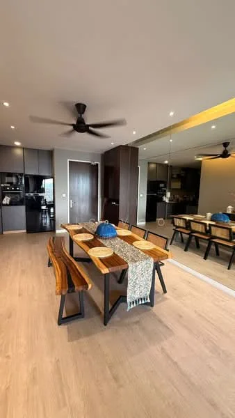 Dining features: wooden dining table with benches, blue decorative bowl on table, woven table runner, 5-blade ceiling fan, mirrored wall, light wood flooring, recessed downlights, black cabinetry, open kitchen view, dark accent wall; style: modern.